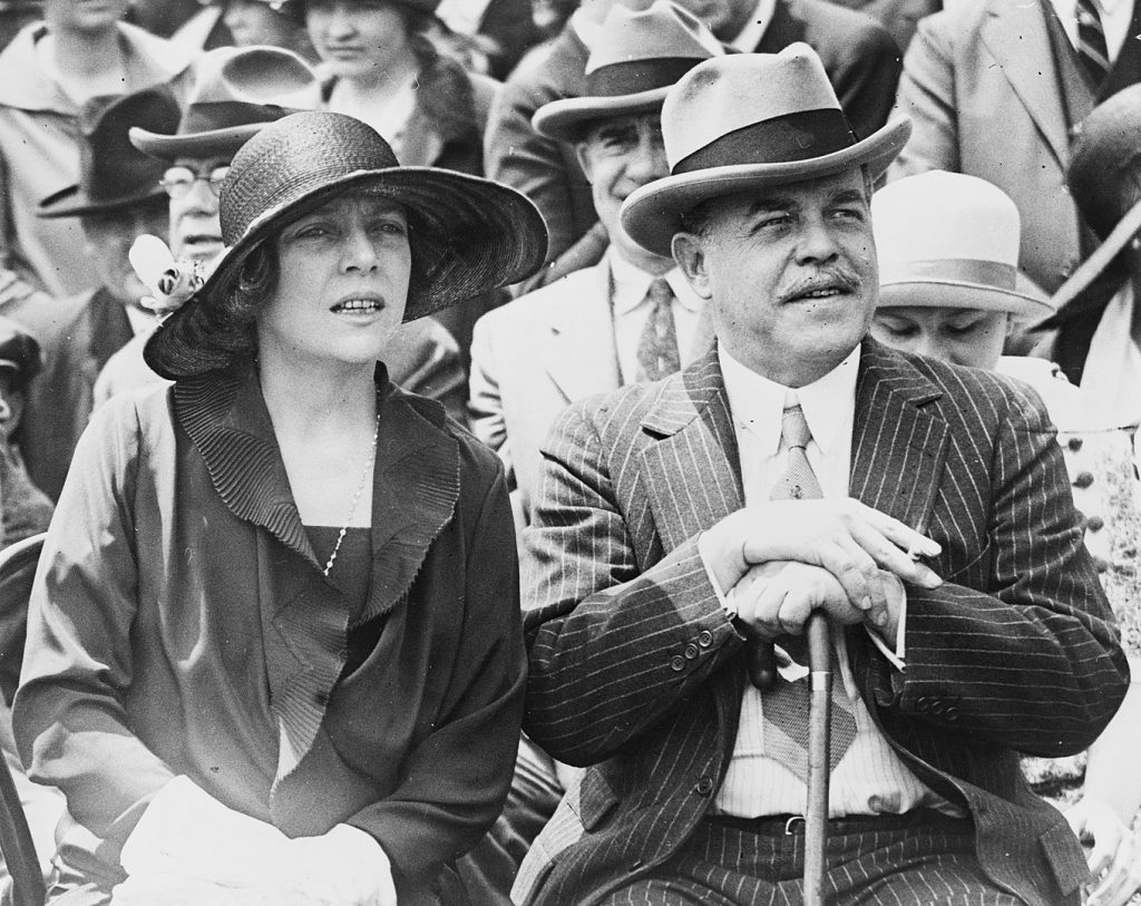 Nicholas Longworth and Alice Roosevelt Longworth "snapped on the Capitol steps in 1926 as they watched the Indians from Arizona put on their snake dance."